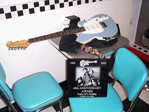 Peter's Guitar and award presented to him by Paul Russo, owner of Cool Scoops